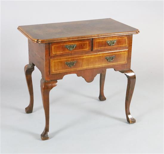 An early 18th century walnut lowboy, W.2ft 6in. D.1ft 7in. H.2ft 3in.